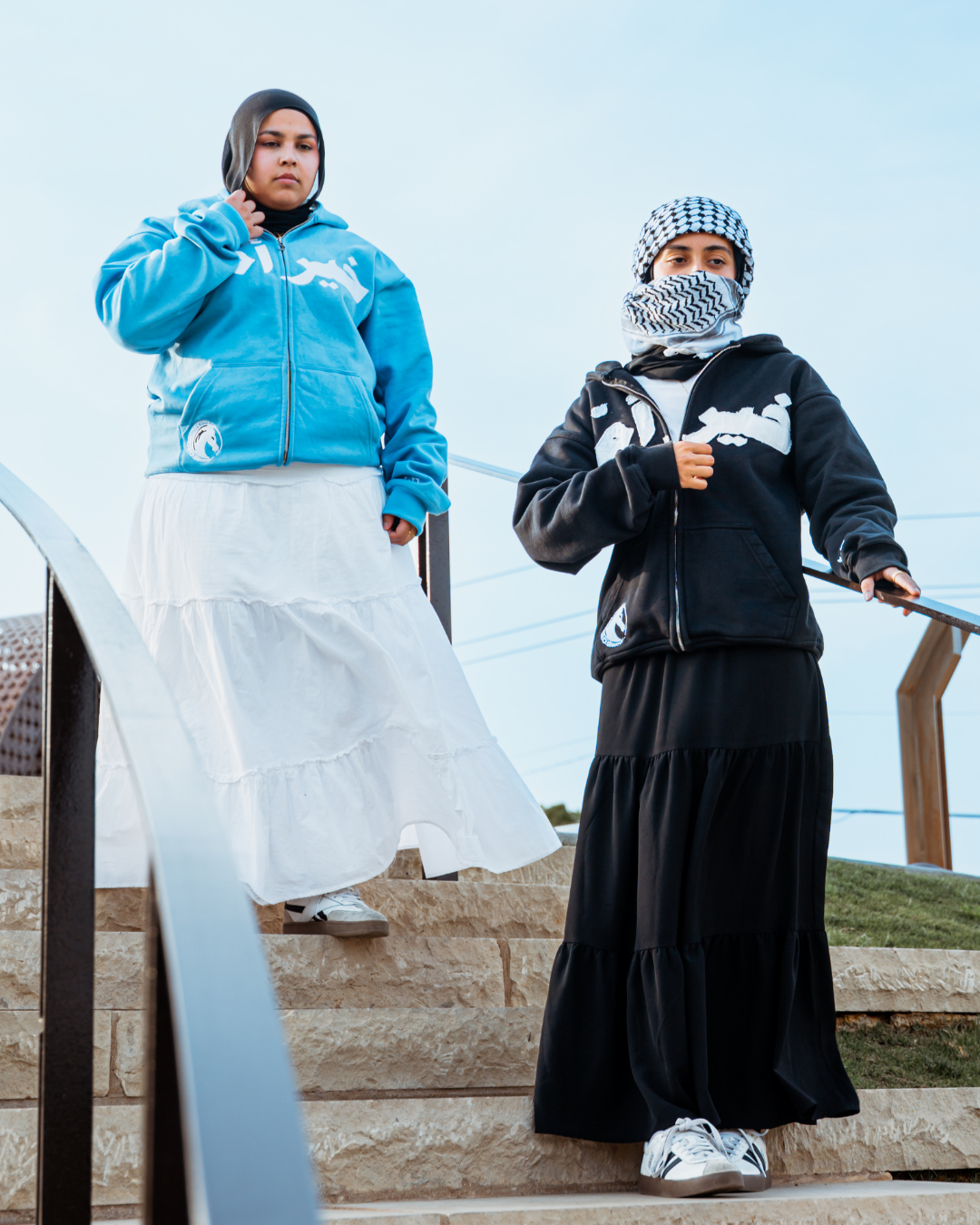 Merch portrait featuring the powder blue hoodie.