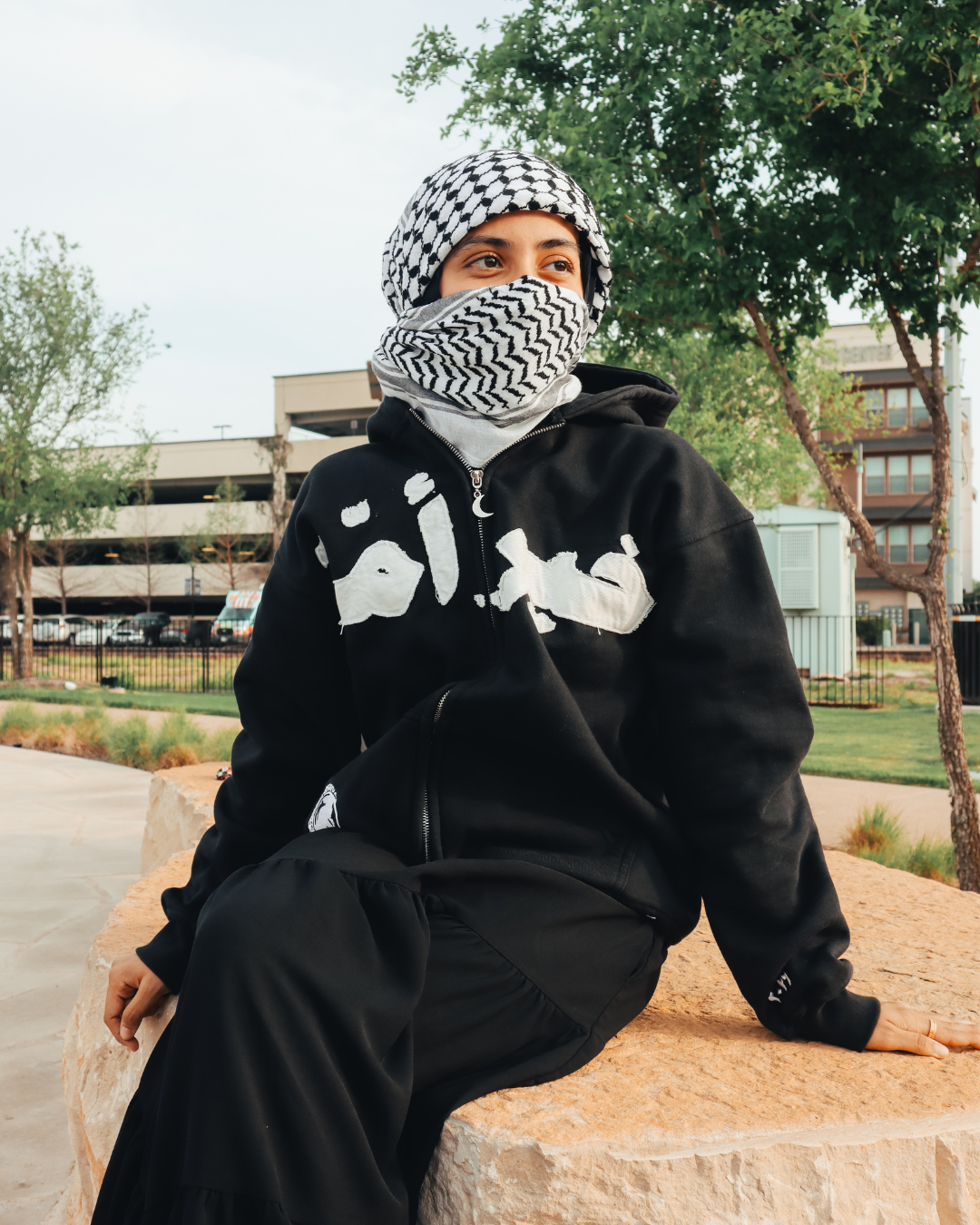 Campaign photo featuring the powder blue hoodie.